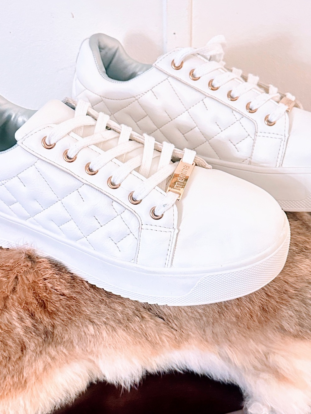 Quilted White Low-Top Sneakers with Gold Eyelets